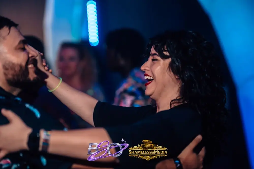 A couple laughing together on the dance floor