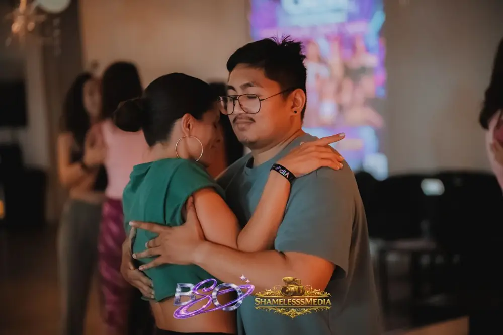 A couple hugging and smiling